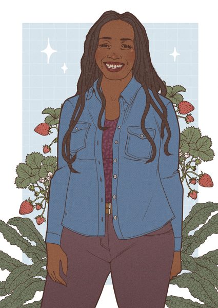 Jennifer Taylor stands in front of strawberries and kale