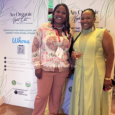 Pictured left to right, Janae Betterton, Client Experience Specialist at Oregon Tilth, and Stephanie Jerger, Vice President of Operations at the Organic Trade Association and Board President of Oregon Tilth, connecting at Expo West and reflecting the collaboration that strengthens the organic community.